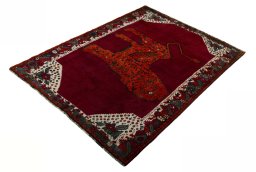 Corner detail of 2000s Persian Gabbeh rug showing border pattern and Wool pile