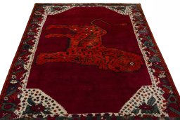 Surface texture of 2000s Persian Gabbeh rug with natural Wool and intricate pattern