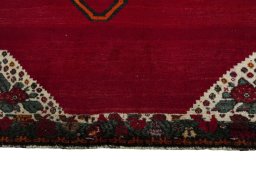 Central medallion detail of 2000s Persian Gabbeh rug from Iran / Persia