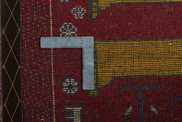 Close-up detail of 2000s Persian Gabbeh rug from Iran / Persia showing Wool weave