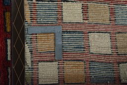 Close-up detail of 2000s Persian Gabbeh rug from Iran / Persia showing Wool weave