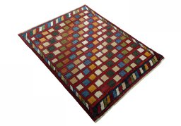 Close-up detail of 2000s Persian Gabbeh rug from Iran / Persia showing Wool weave
