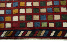 Central medallion detail of 2000s Persian Gabbeh rug from Iran / Persia