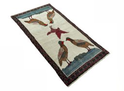 Close-up detail of 2000s Persian Gabbeh rug from Iran / Persia showing Wool weave