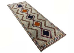 Close-up detail of 2000s Persian Gabbeh rug from Iran / Persia showing Wool weave
