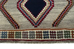 Central medallion detail of 2000s Persian Gabbeh rug from Iran / Persia