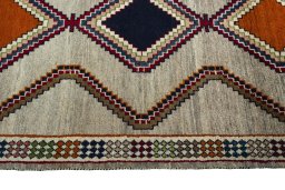 Close-up detail of 2000s Persian Gabbeh rug from Iran / Persia showing Wool weave