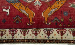 Central medallion detail of 2000s Persian Gabbeh rug from Iran / Persia
