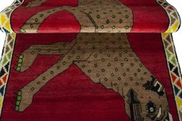 Full view of 2000s Persian Gabbeh rug from Iran / Persia, 157 × 105 cm in Red tones