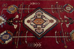 Central medallion detail of 2000s Persian Gabbeh rug from Iran / Persia