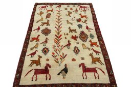 Surface texture of 2000s Persian Gabbeh rug with natural Wool and intricate pattern