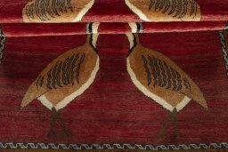Full view of 2000s Persian Gabbeh rug from Iran / Persia, 215 × 124 cm in Red tones