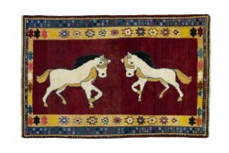 Full view of 2000s Persian Gabbeh rug from Iran / Persia, 184 × 122 cm in Red tones