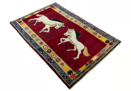Close-up detail of 2000s Persian Gabbeh rug from Iran / Persia showing Wool weave