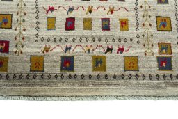 Central medallion detail of 2000s Persian Gabbeh rug from Iran / Persia