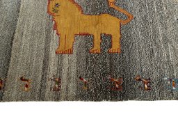 Close-up detail of 2000s Persian Gabbeh rug from Iran / Persia showing Wool weave