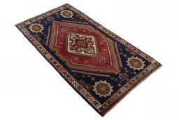Close-up detail of 2000s Persian Gabbeh rug from Iran / Persia showing Wool weave