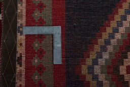 Close-up detail of 2000s Persian Gabbeh rug from Iran / Persia showing Wool weave
