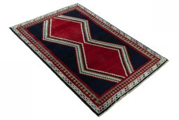 Close-up detail of 2000s Persian Gabbeh rug from Iran / Persia showing Wool weave
