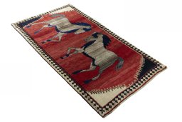 Close-up detail of 2000s Persian Gabbeh rug from Iran / Persia showing Wool weave