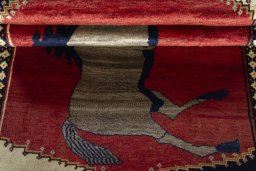 Full view of 2000s Persian Gabbeh rug from Iran / Persia, 185 × 103 cm in Red tones