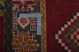 Close-up detail of 2000s Persian Gabbeh rug from Iran / Persia showing Wool weave