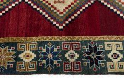 Close-up detail of 2000s Persian Gabbeh rug from Iran / Persia showing Wool weave