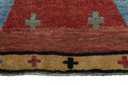 Central medallion detail of 2000s Persian Gabbeh rug from Iran / Persia