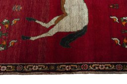 Close-up detail of 2000s Persian Gabbeh rug from Iran / Persia showing Wool weave
