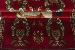 Full view of 2000s Persian Gabbeh rug from Iran / Persia, 196 × 107 cm in Red tones