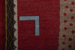 Close-up detail of 2000s Persian Gabbeh rug from Iran / Persia showing Wool weave