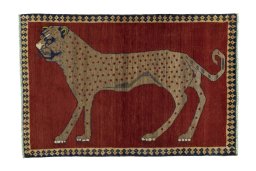 Full view of 2000s Persian Gabbeh rug from Iran / Persia, 155 × 103 cm in Red tones