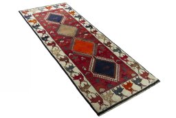 Close-up detail of 2000s Persian Gabbeh rug from Iran / Persia showing Wool weave