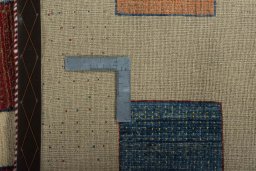 Close-up detail of 2000s Persian Gabbeh rug from Iran / Persia showing Wool weave