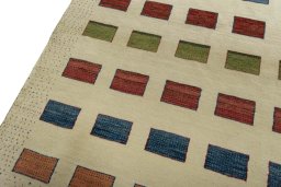 Backside of handmade 2000s Persian Gabbeh rug showing knot structure and weave density