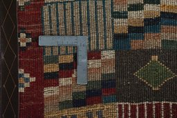 Close-up detail of 2000s Persian Gabbeh rug from Iran / Persia showing Wool weave