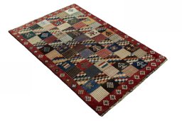 Close-up detail of 2000s Persian Gabbeh rug from Iran / Persia showing Wool weave