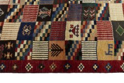 Close-up detail of 2000s Persian Gabbeh rug from Iran / Persia showing Wool weave