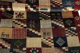 Full view of 2000s Persian Gabbeh rug from Iran / Persia, 160 × 108 cm in Multi Color tones