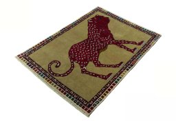 Corner detail of 2000s Persian Gabbeh rug showing border pattern and Wool pile