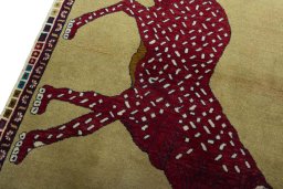 Backside of handmade 2000s Persian Gabbeh rug showing knot structure and weave density