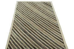 Surface texture of 2000s Persian Gabbeh rug with natural Wool and intricate pattern