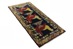 Close-up detail of 2000s Persian Gabbeh rug from Iran / Persia showing Wool weave
