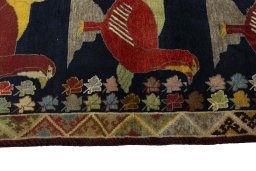 Close-up detail of 2000s Persian Gabbeh rug from Iran / Persia showing Wool weave