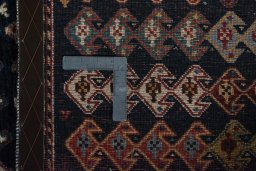 Close-up detail of 2000s Persian Gabbeh rug from Iran / Persia showing Wool weave