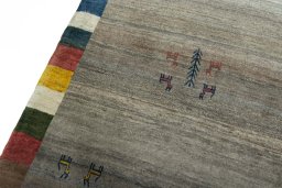 Backside of handmade New Persian Gabbeh rug showing knot structure and weave density