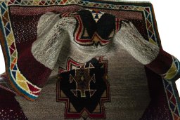 Corner detail of 2000s Persian Gabbeh rug showing border pattern and Wool pile