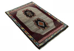 Close-up detail of 2000s Persian Gabbeh rug from Iran / Persia showing Wool weave