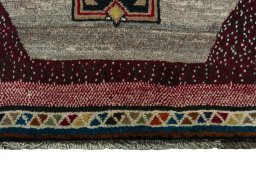 Central medallion detail of 2000s Persian Gabbeh rug from Iran / Persia