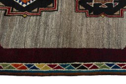 Close-up detail of 2000s Persian Gabbeh rug from Iran / Persia showing Wool weave